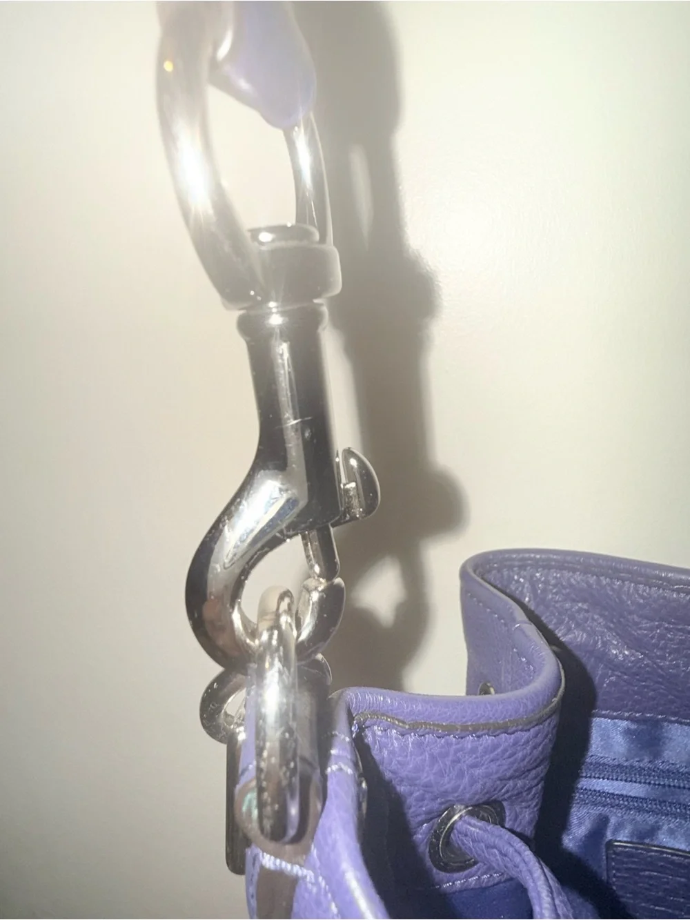 COACH purple pebbled bucket drawsting purse with slouchy silhouette.